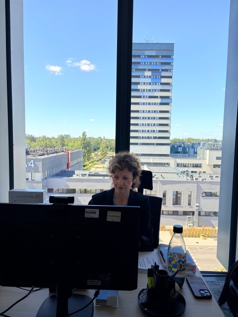 At her desk